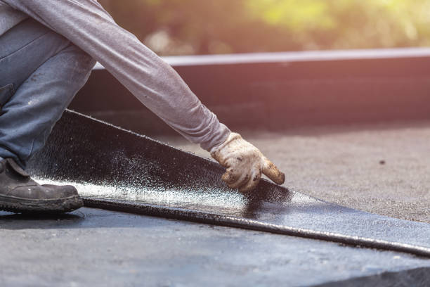 Professional Basement Waterproofing technician working in Bluffton, OH